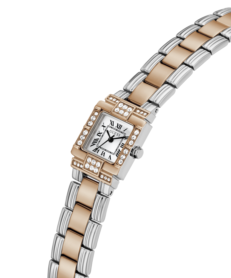 A women's two-tone stainless steel and rose gold watch with a rectangular bezel set with small diamonds, featuring a white dial with black Roman numerals and a matching two-tone link bracelet. lifestyle