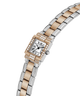 A women's two-tone stainless steel and rose gold watch with a rectangular bezel set with small diamonds, featuring a white dial with black Roman numerals and a matching two-tone link bracelet. lifestyle