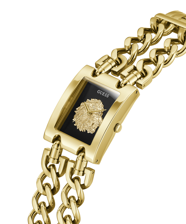 Gold-tone Guess wristwatch with a rectangular case, black dial, lion head motif, and matching chain bracelet on a white background. lifestyle