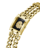 Gold-tone Guess wristwatch with a rectangular case, black dial, lion head motif, and matching chain bracelet on a white background. lifestyle