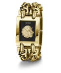 Gold-tone Guess watch with a rectangular black dial, a raised lion head logo at the center, and a matching chain-link bracelet on a white background.