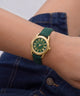 GUESS Archive Chris 95 Green Gold Tone Analog Watch on wrist