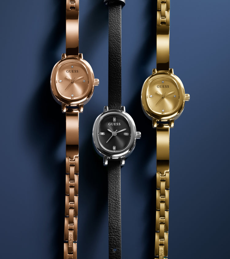 3 womens petite watches on a blue background