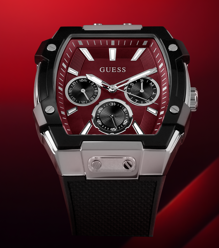 Guess watch with red dial and black strap on a red background
