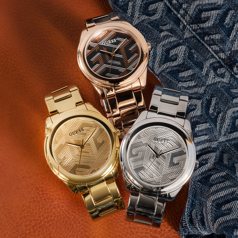 three mongram logo watches in silver, gold and rose gold