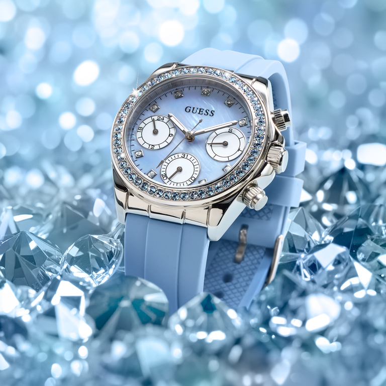 Limited Edition with Swarovski ReCreated™ crystals watch with gemstone accents on a blue gemstone background