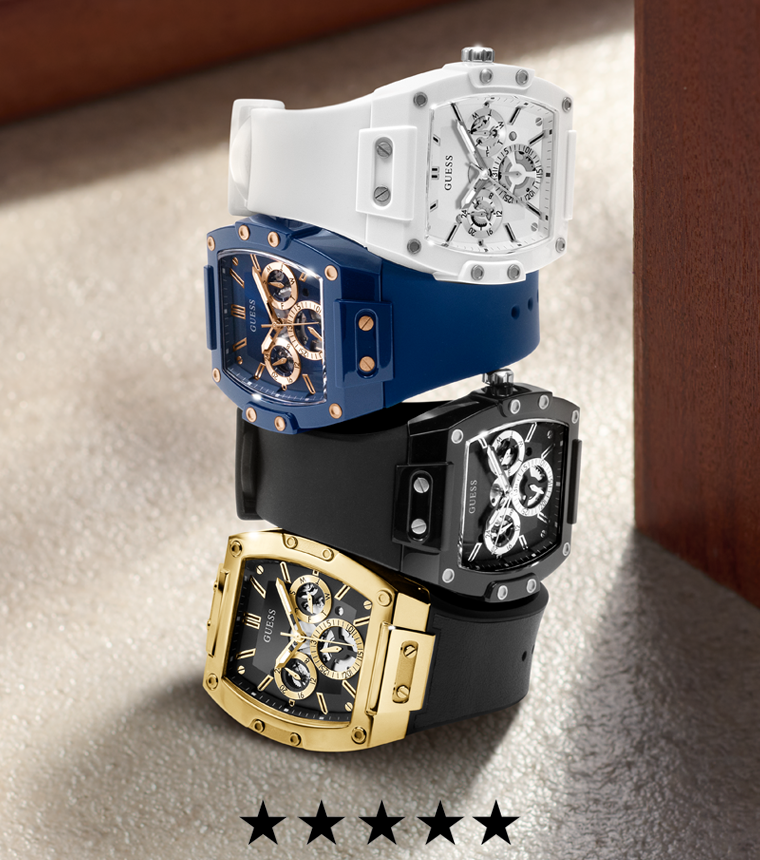 Five mens Guess watches in different colors in a row with star icons