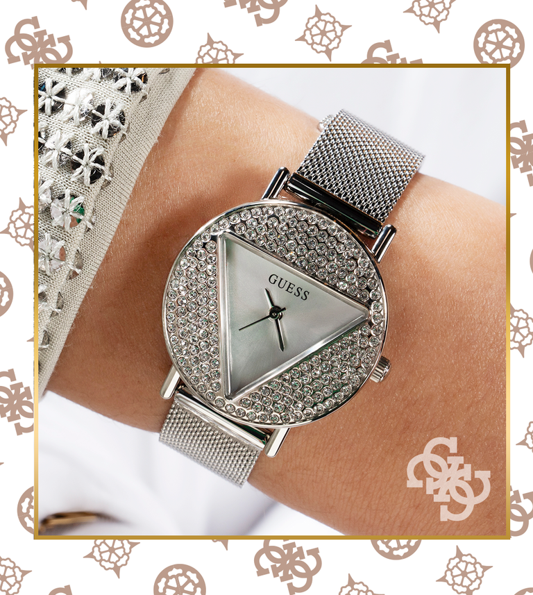 silver logo watch with mesh band on logo G background