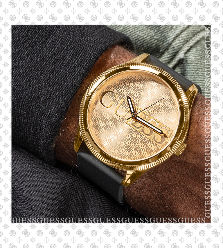 mens gold logo watch with silicone strap and G logo pattern border