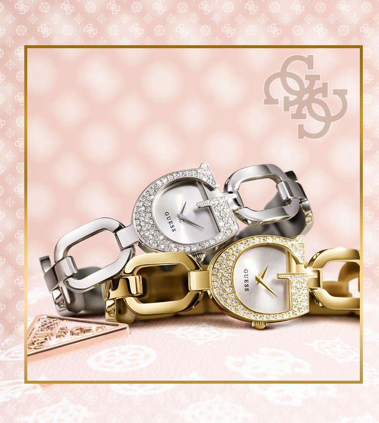 gold and silver logo watches on patterned background with G logo and gold frame