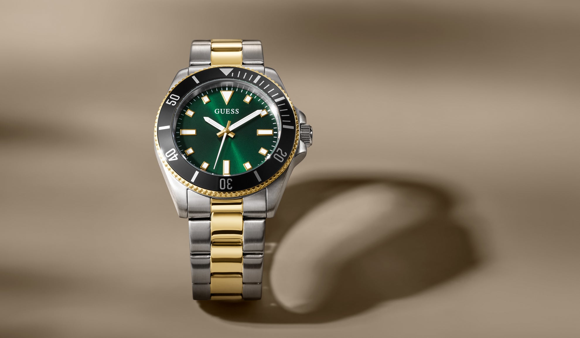 GW0968G4 with green dial on a brown background