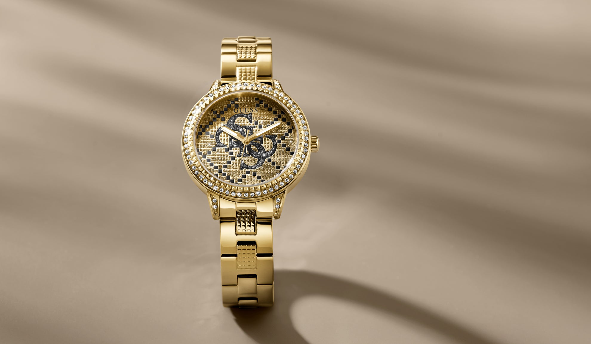 ladies gold watch with quattro G logo on dial