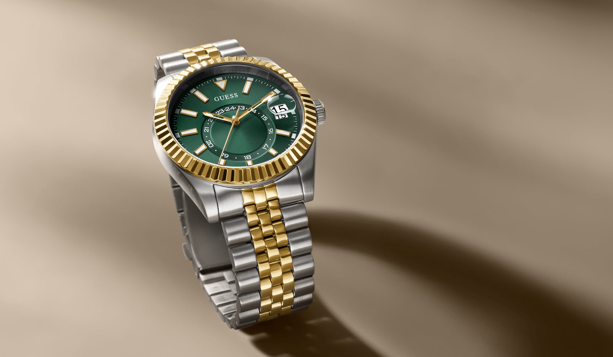 mens two tone watch with coin edge bezel and green dial GW0977G4