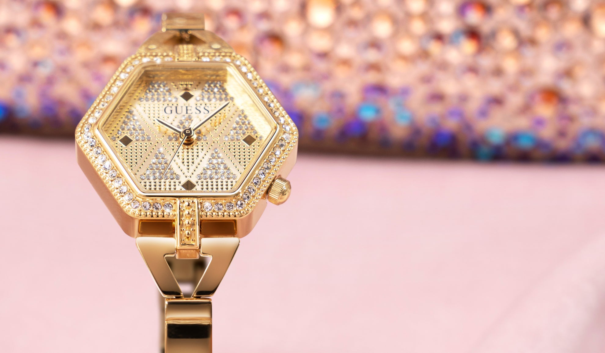 gold hexagon shaped womens watch with stones