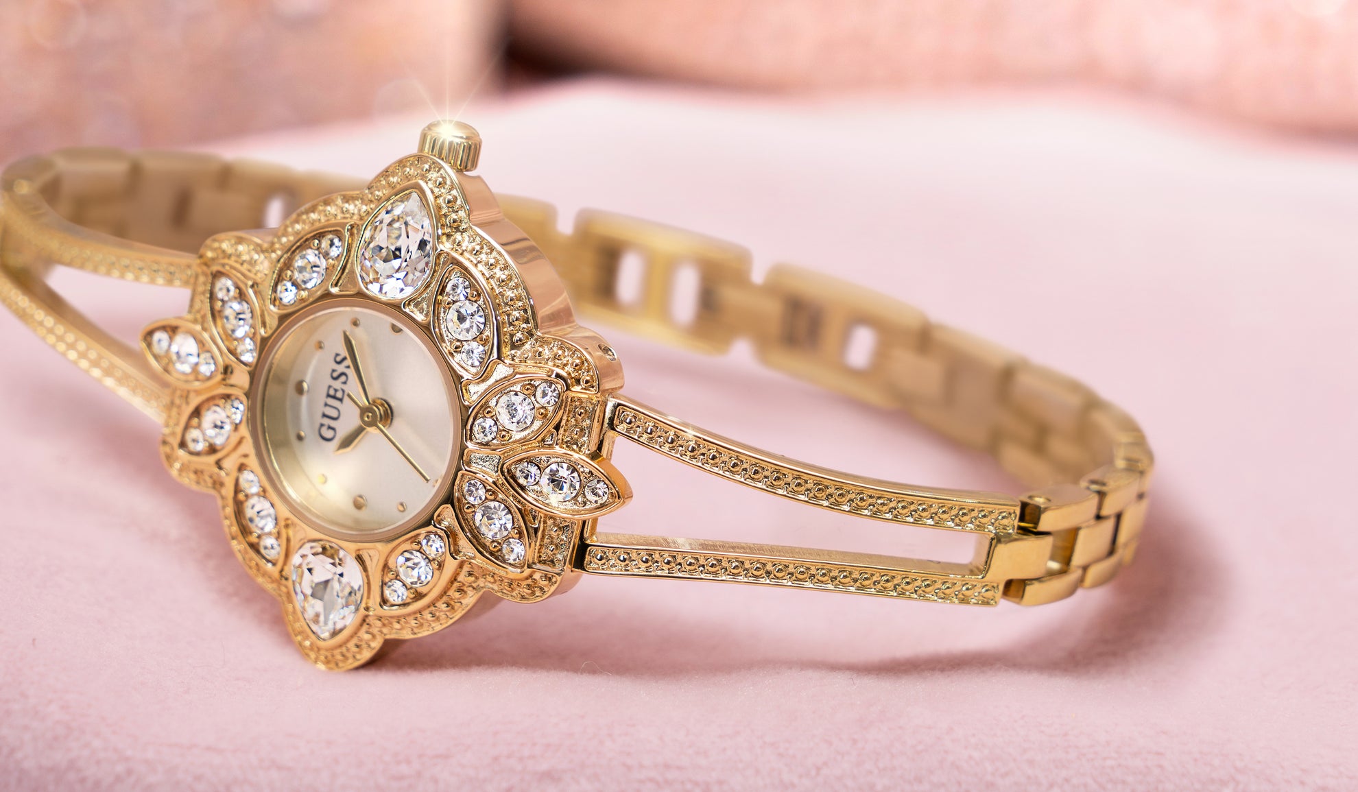 womens gold bangle watch with floral stone dial