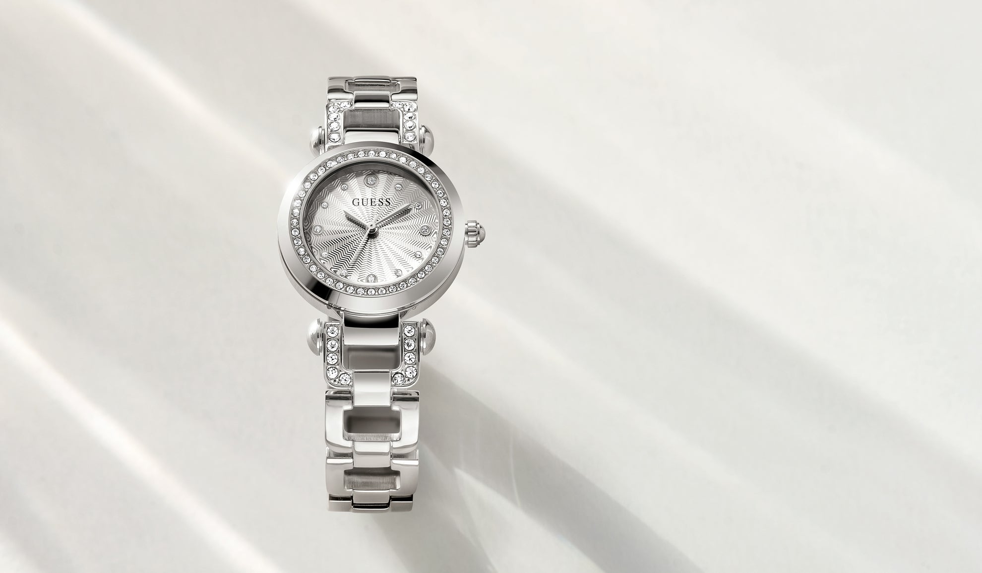 Silver watch with gemstone accents on a white background gw0869l3