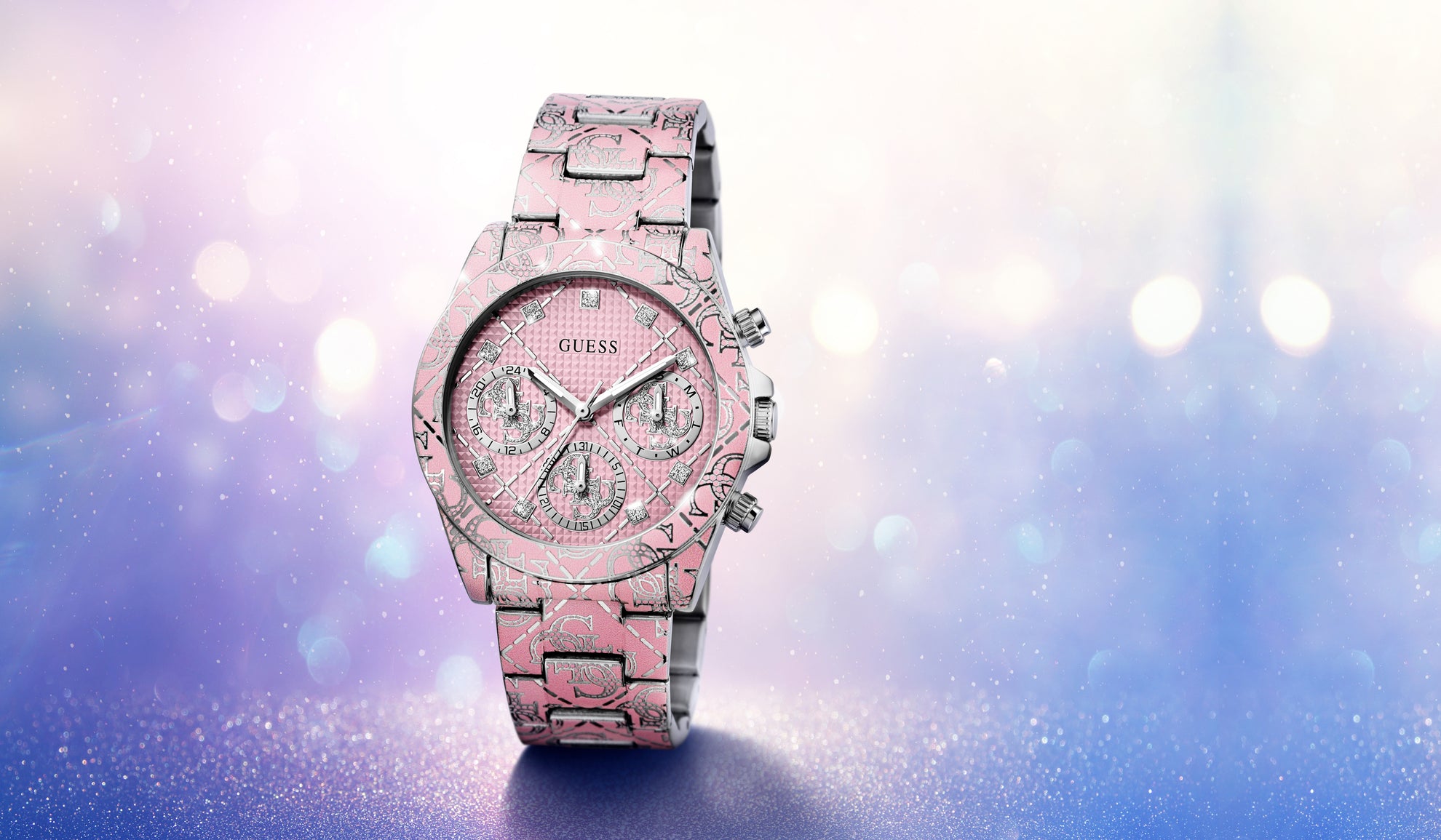 Pink Guess watch  GW0986L1 on a sparkling background