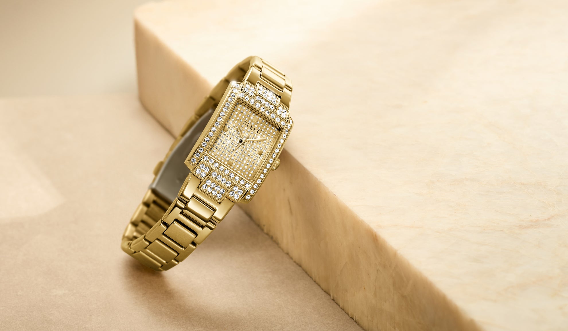 Womens gold watch with crystals and square case