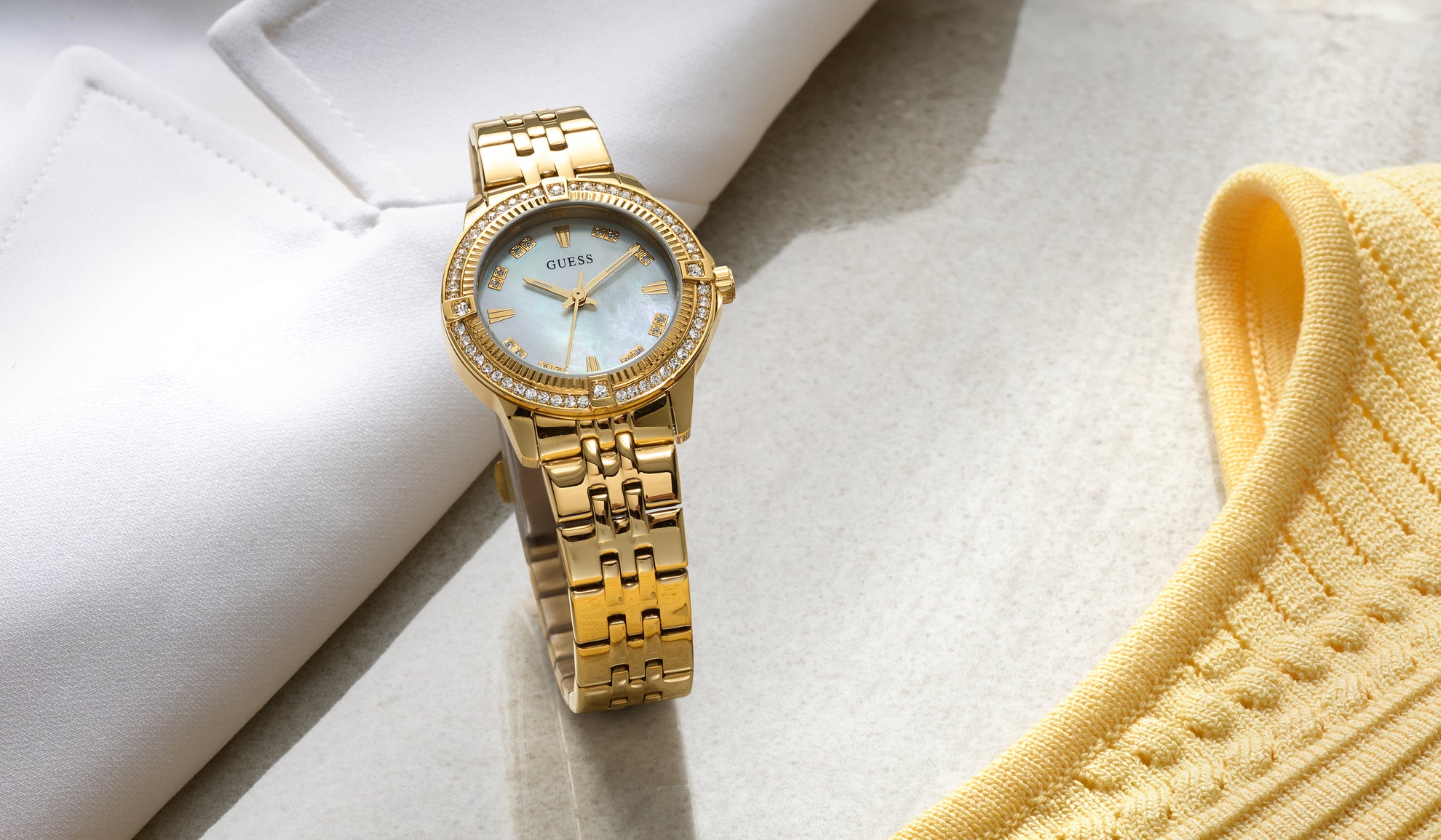 Womens gold GUESS Watch with mother of pearl dial GW1027L2