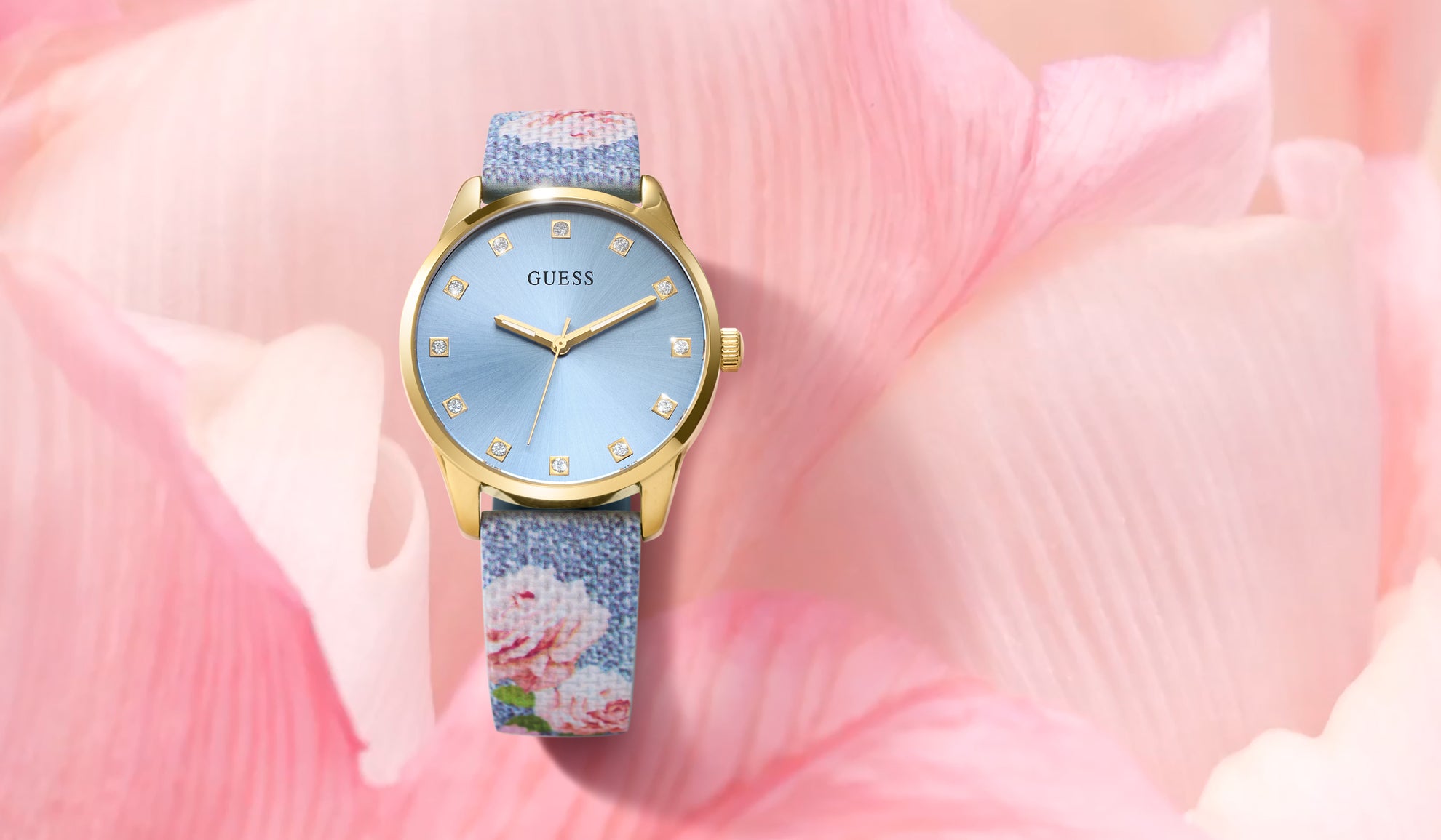 Guess watch with floral strap on pink petals