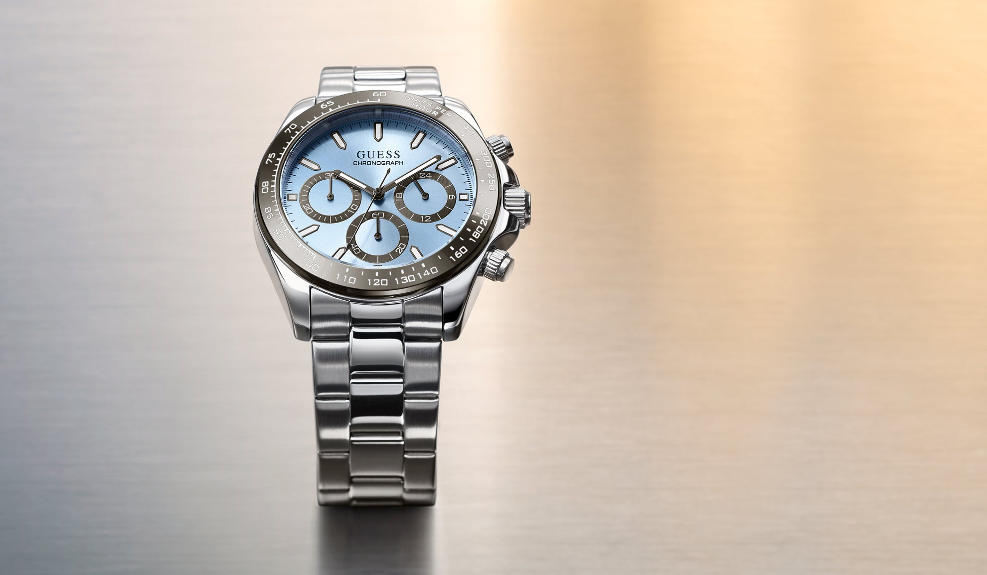 Silver watch with a blue face on a gradient background GW1058G1