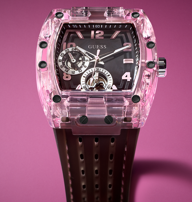 Pink transparent Sporting Pink watch with black strap on a pink background