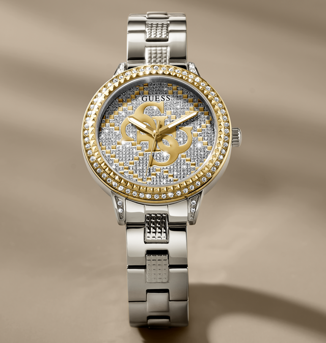 Silver and gold watch with brand logo on a beige background GW0944L3