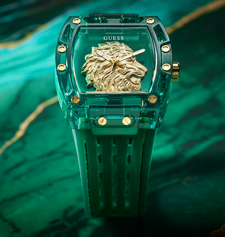 Green Guess watch with lion emblem on a green background