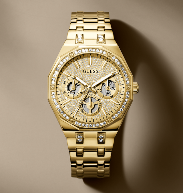 Gold watch with diamond accents on a brown background GW0960G2