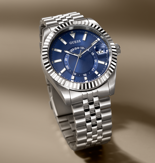 Silver watch with blue dial on a brown background GW0977G1