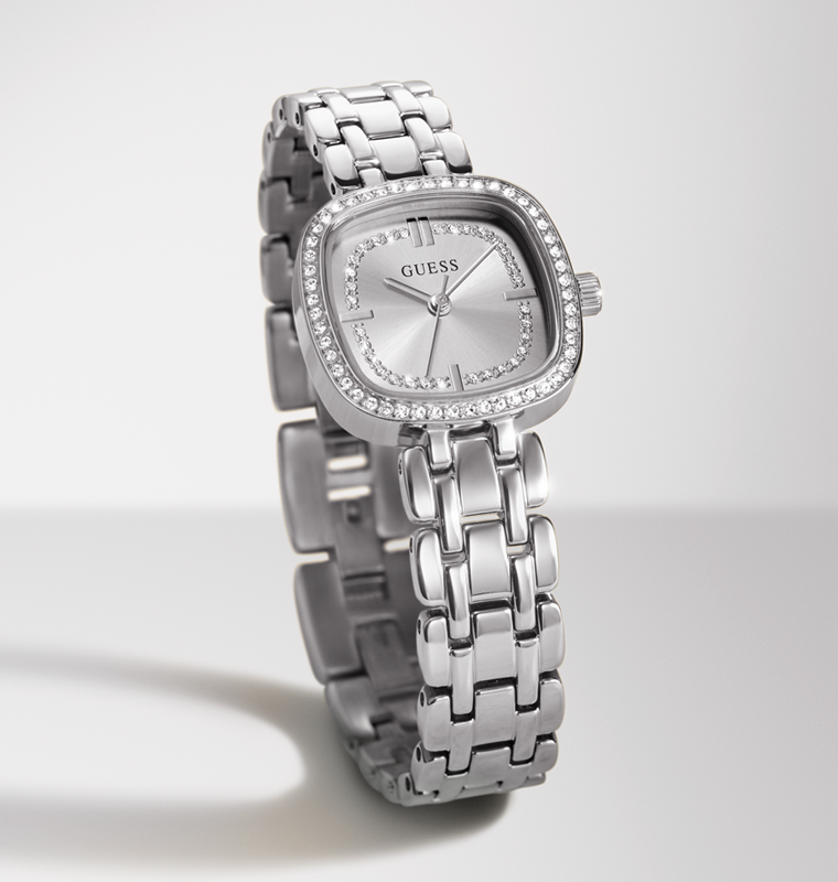 A silver-tone stainless steel wrist watch with a square bezel encrusted with clear crystals, a matching crystal-detailed dial, and a multi-link bracelet, shown on a light gray background.