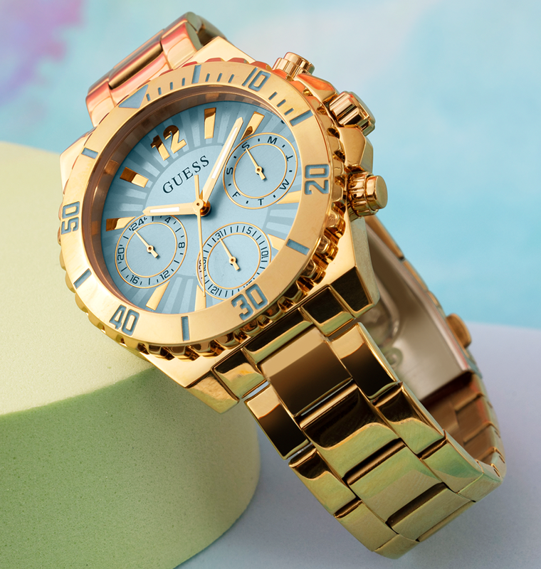 gold womens watch with light blue dial
