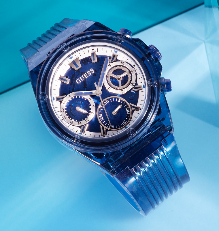 blue sustainable guess watch on blue background