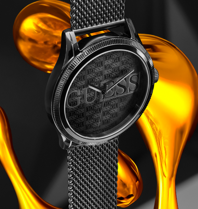 mens black watch with mesh band and logo on dial on liquid gold background