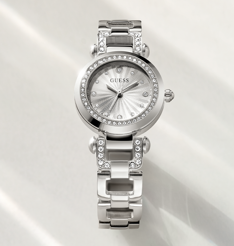 Silver Guess watch with a detailed face on a white background  gw0869l3