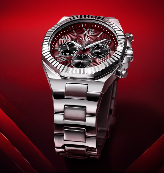 Silver watch with a red dial on a red background gw0703g7