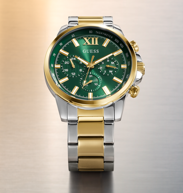 Gold and silver watch with green dial on a gradient background