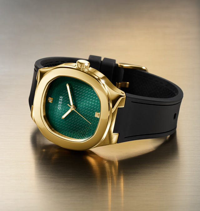 Gold watch GW1005G2 with green face and black strap on a reflective surface