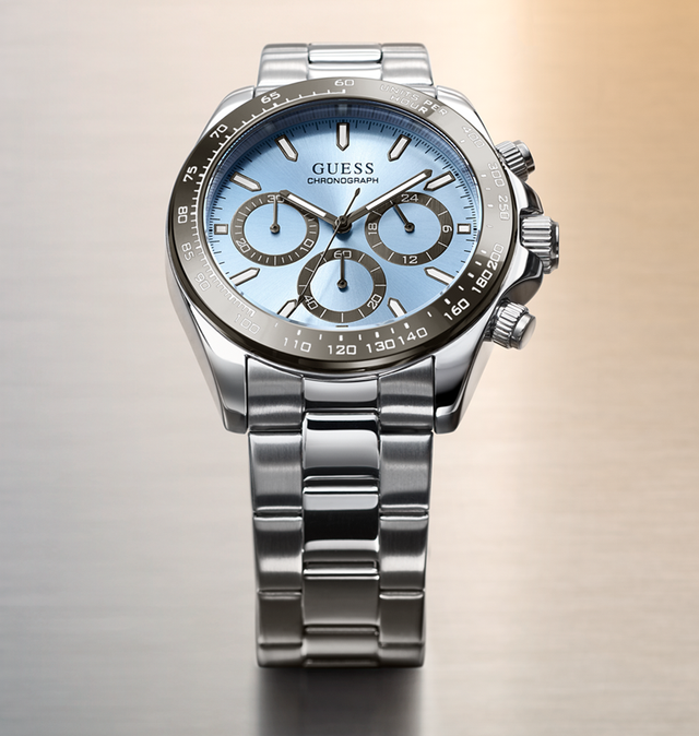 Silver watch with a blue face on a gradient background GW1058G1