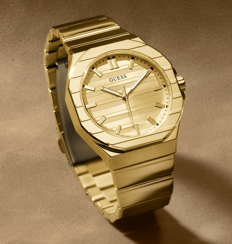 Gold Guess watch GW1070G2  on a brown background