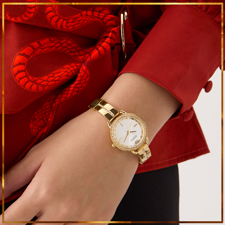 womens gold lunar new year watch with snake motif