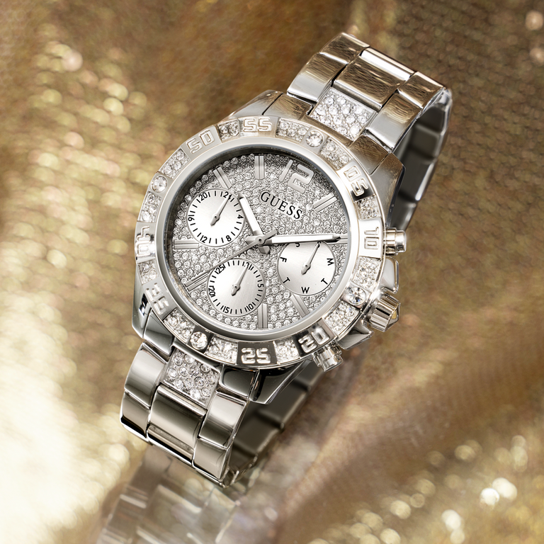 silver glitz watch on gold background