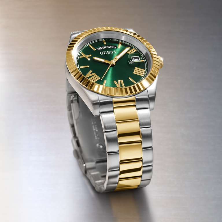 mens silver and gold watch with a green dial