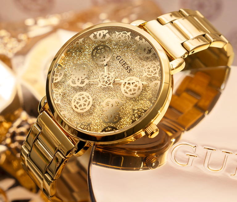Gold logo watch with logo pattern on dial