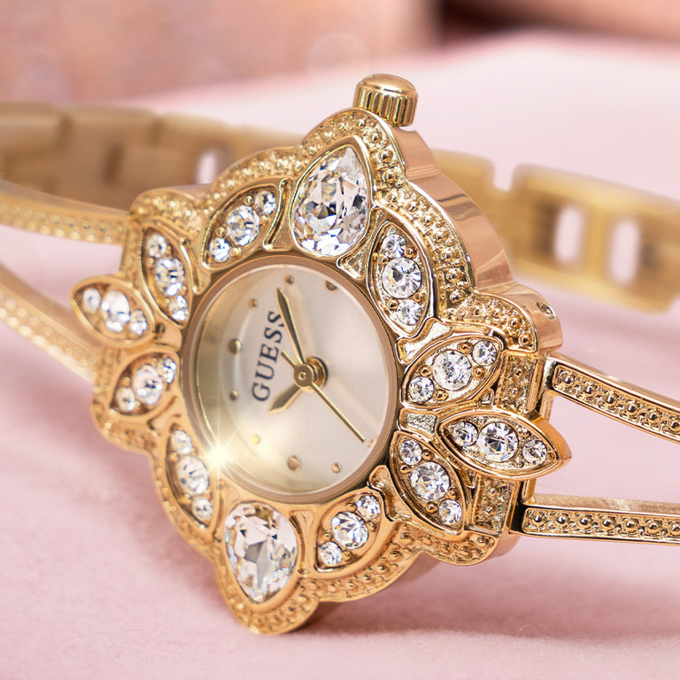 womens floral dial gold watch with stones on dial