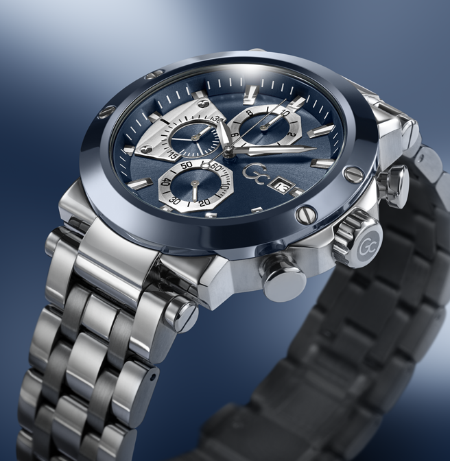 Silver watch with a blue face on a gradient blue background