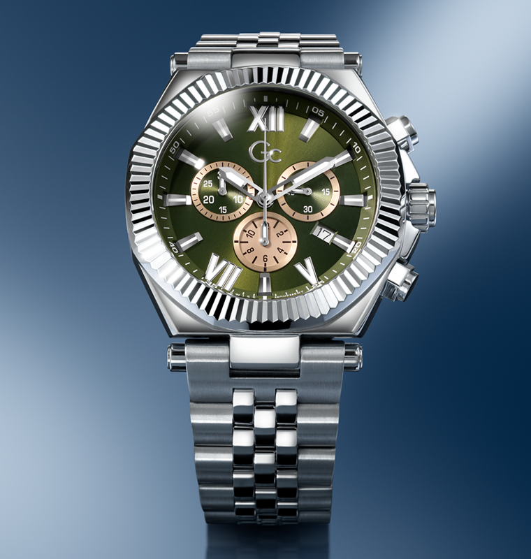 Silver watch with a green dial on a gradient blue background