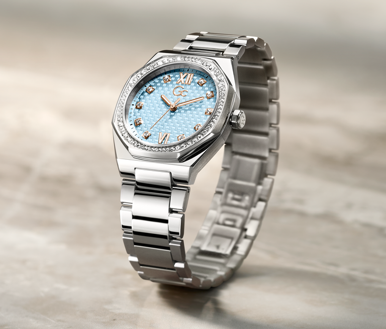silver watch with blue dial for women