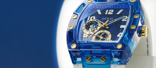 Close up of mens blue and white watch dial