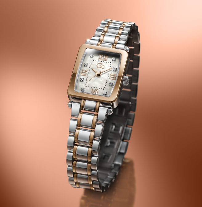 Luxury watch Z71001L1 with a two-tone metal band on a gradient brown background